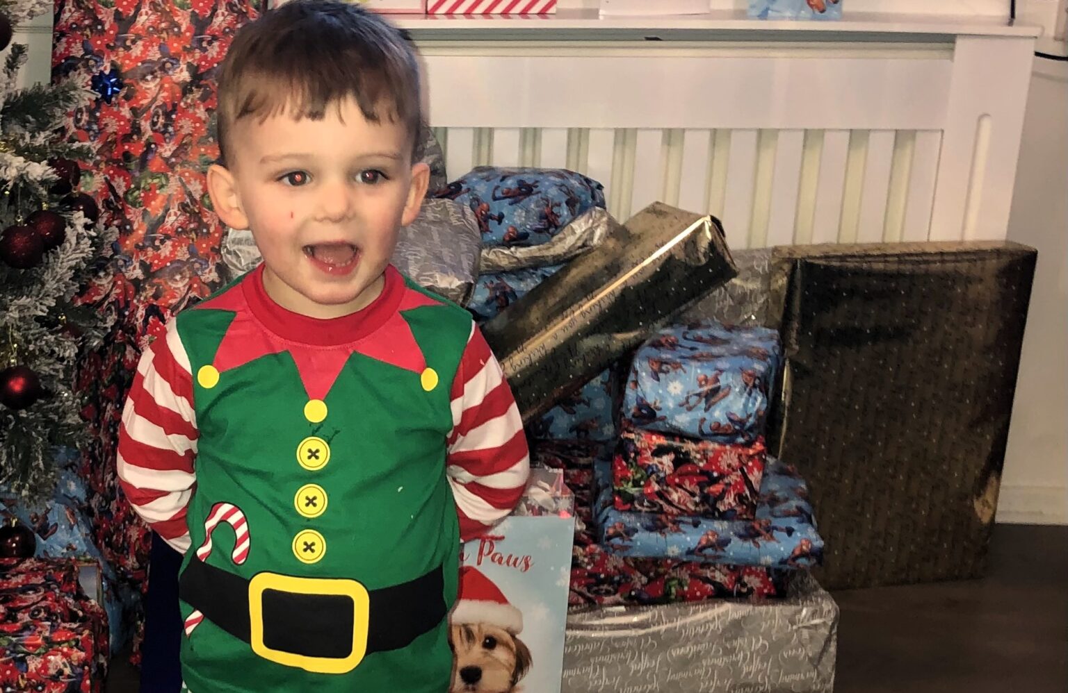 Seven-year-old Rowan melts hearts by using his savings to buy Christmas gifts for less fortunate kids, spreading joy with over 90 presents delivered so far.