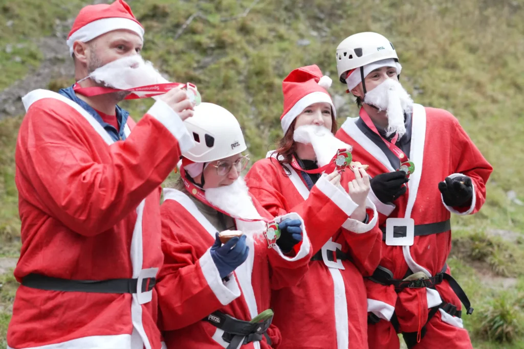 OAP, 82, abseils down iconic 60ft ravine dressed as Father Christmas