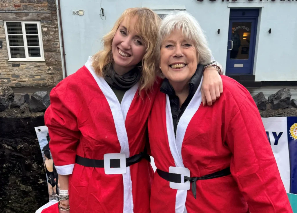 An 82-year-old woman abseiled down Cheddar Gorge dressed as Santa, raising £2,000 for St Margaret's Hospice. The festive event raised £18,500 for end-of-life care in Somerset.