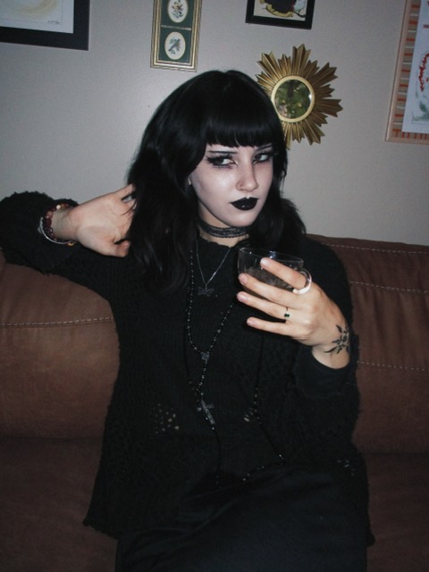 21-year-old Camille Cox embraces goth culture despite public backlash, transforming her look to feel alive and inspiring others to express their true selves boldly.