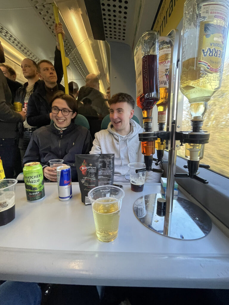 Tottenham fans mocked for bringing a posh bar setup, complete with gin, Pernod, ice, and lemons, on a train to their Europa League clash with Rangers in Glasgow.