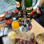 Tottenham fans mocked for bringing a posh bar setup, complete with gin, Pernod, ice, and lemons, on a train to their Europa League clash with Rangers in Glasgow.