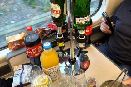 Tottenham fans mocked for bringing a posh bar setup, complete with gin, Pernod, ice, and lemons, on a train to their Europa League clash with Rangers in Glasgow.