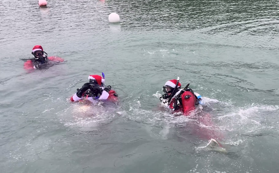 Scores of Santas donned scuba gear for a festive dive in Somerset, raising funds for RNLI and Help for Heroes. The annual event has collected £52,000 since 2007.