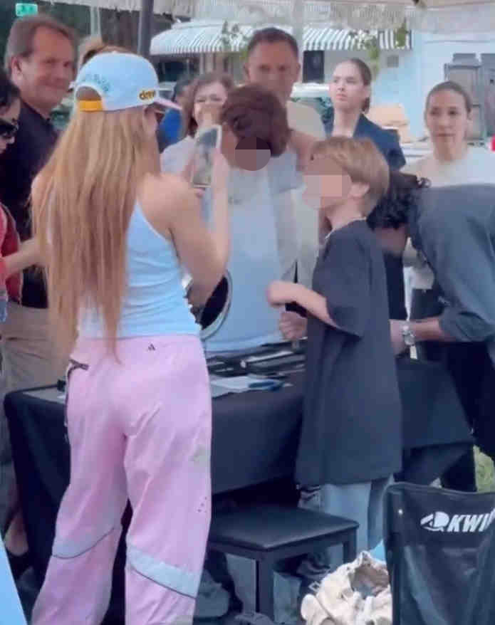 Shakira spotted supporting her 9-year-old son Sasha's 'Bad Boyz' brand at a Miami bazaar, showcasing his jewelry and T-shirts while charming local shoppers.