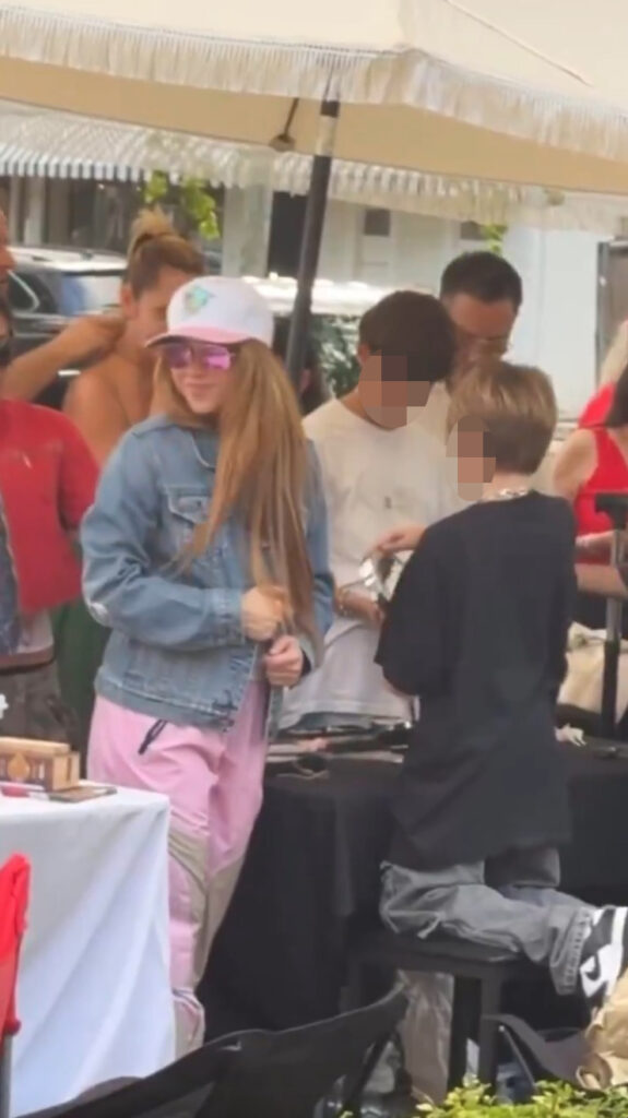 Shakira spotted supporting her 9-year-old son Sasha's 'Bad Boyz' brand at a Miami bazaar, showcasing his jewelry and T-shirts while charming local shoppers.