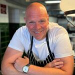 Tom Kerridge raises lobster prices to £80 at his posh Harrods restaurant, sparking backlash amid the cost-of-living crisis. Meanwhile, desserts see a slight price drop.