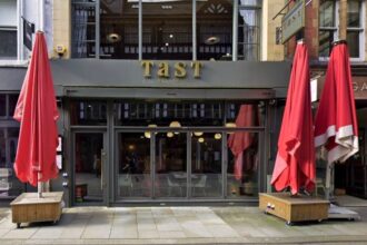 Pep Guardiola's restaurant, Tast, offers a £95 New Year's Eve tapas menu in Manchester, sparking debate over its price while City faces on-pitch struggles and FFP issues.