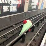 A London Tube train faced delays after a 6ft soft toy chilli pepper ended up on the tracks near Marble Arch, sparking humor and frustration among commuters.