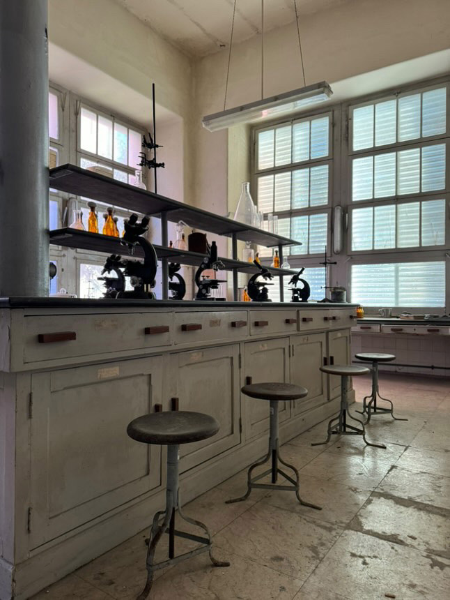 Urban explorer Ben Stevens uncovers a creepy abandoned animal testing lab in Portugal, filled with chemicals, microscopes, and eerie marble autopsy slabs, sparking local ghostly tales.