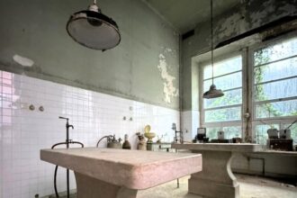 Urban explorer Ben Stevens uncovers a creepy abandoned animal testing lab in Portugal, filled with chemicals, microscopes, and eerie marble autopsy slabs, sparking local ghostly tales.