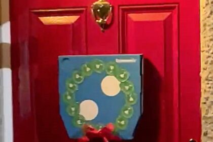 TikToker praises a creative Christmas wreath made from a Domino's pizza box in Wandsworth, proving budget-friendly festive decor can outshine store-bought options.