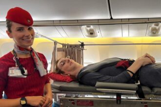 Rumeysa Gelgi, the world’s tallest woman at 7ft 0.09ins, shares her inspiring air travel journey, flying via stretcher due to her condition. A step toward accessible travel!