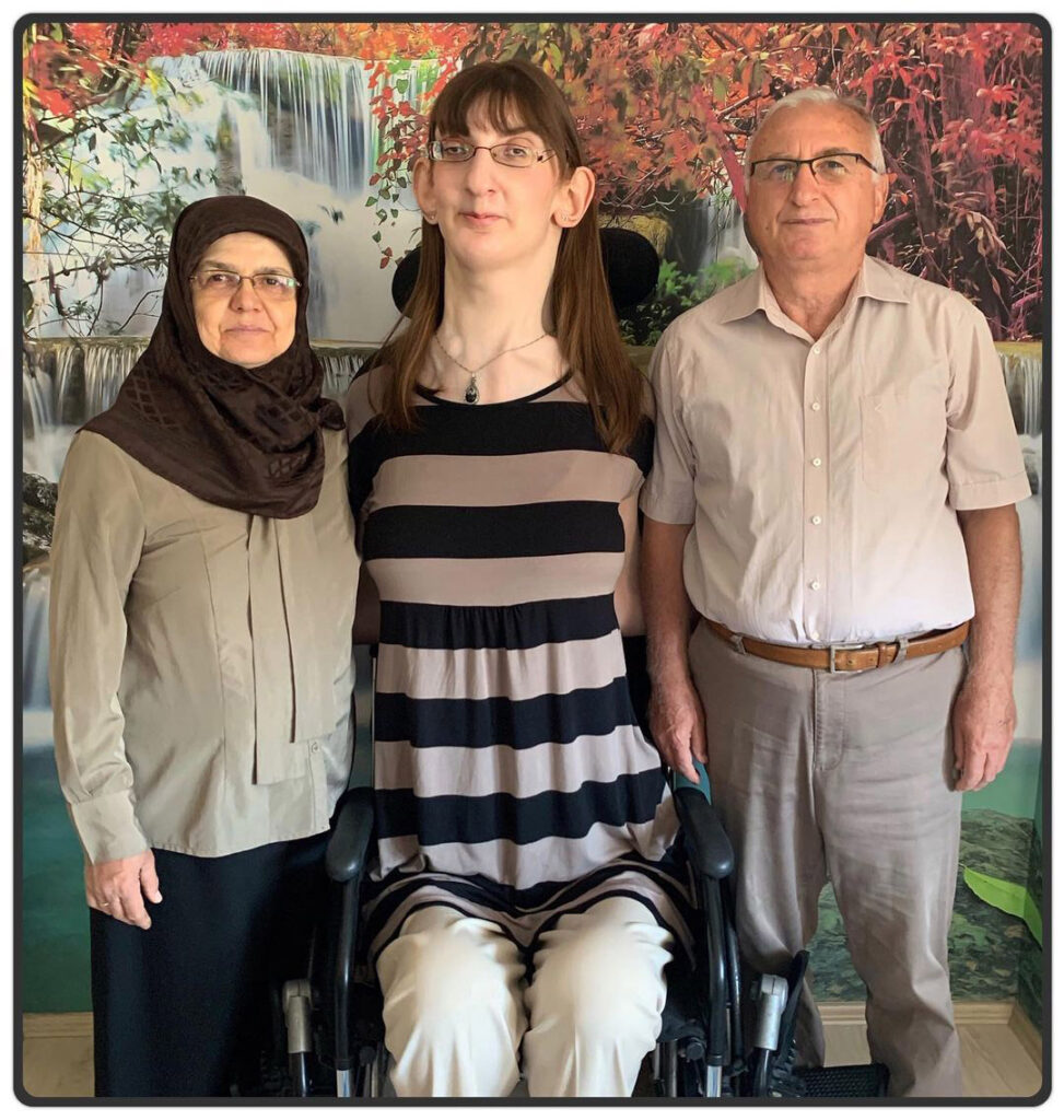 Rumeysa Gelgi, the world’s tallest woman at 7ft 0.09ins, shares her inspiring air travel journey, flying via stretcher due to her condition. A step toward accessible travel!