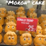 A Danish bakery is selling orange Trump-themed "moron cakes" after his Greenland claims. The pastry, complete with a yellow tuft, is a sweet but cheeky response!