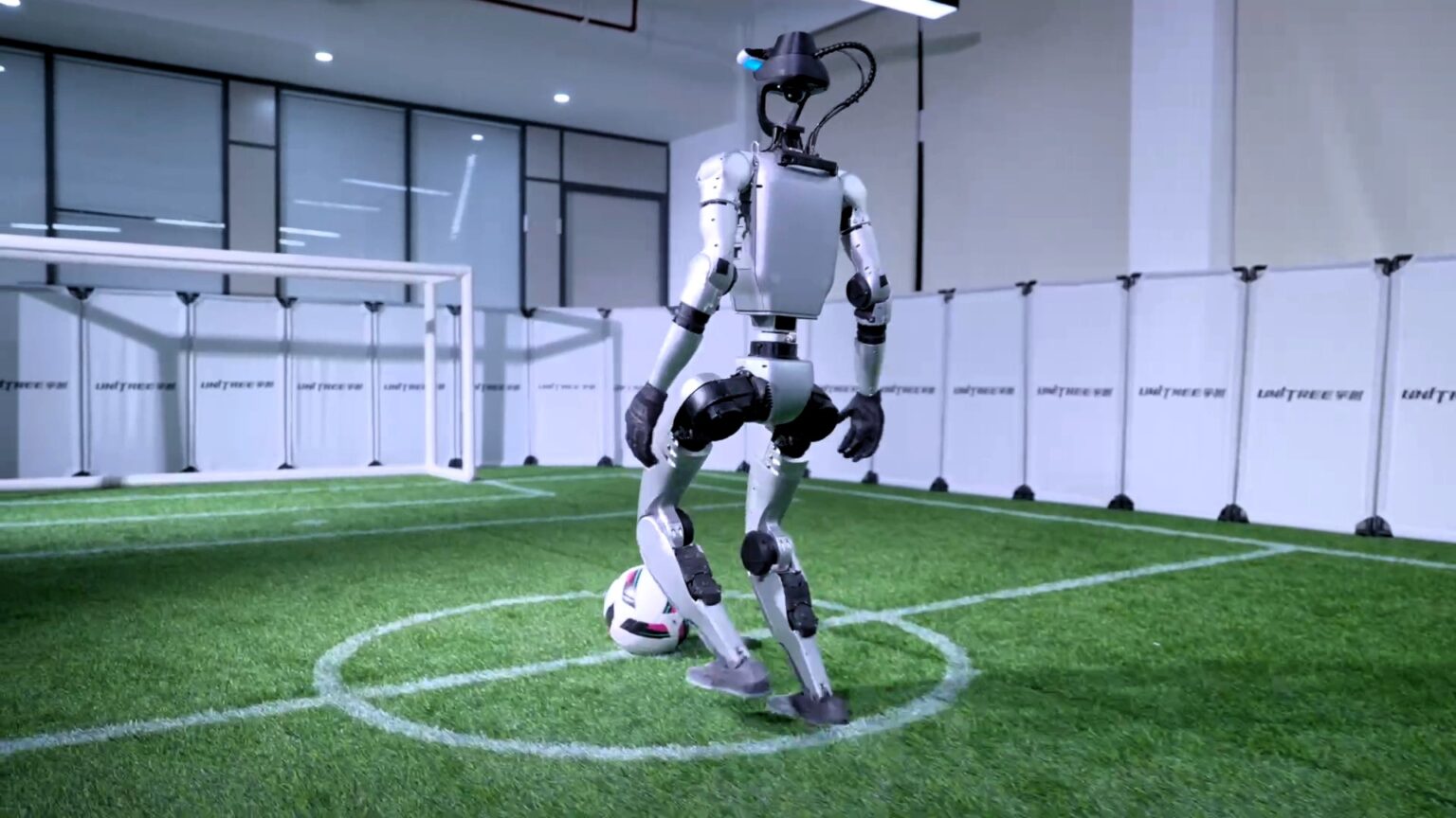 Advanced humanoid G1-Comp robots wow in football trials with agility and precision, hinting at potential appearances in RoboCup 2025 and the World Humanoid Robot Games.