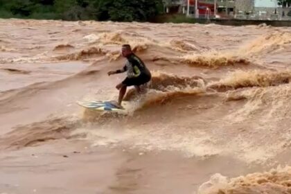 A daring surfer rode the swollen, rapid-moving Doce River in Brazil after heavy rains. Despite warnings from authorities about extreme dangers, Paulo Guido Coelho embraced the challenge.