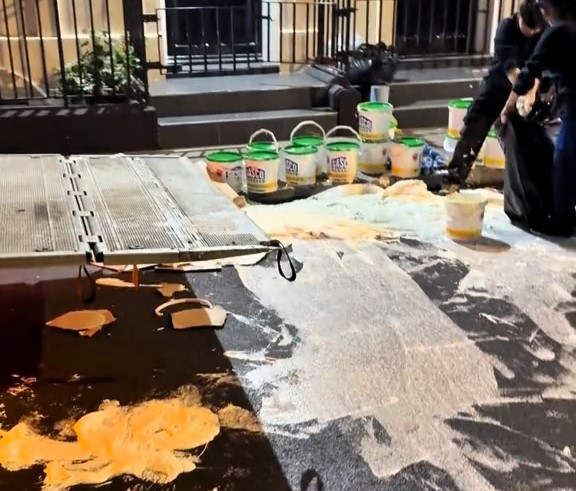 Delivery mishap leaves Covent Garden street covered in gallons of mayonnaise, sparking laughter and puns like “May oh” and “What the Hellman?” as workers clean up the mess.