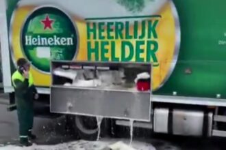 A Heineken truck in the Netherlands accidentally spilled beer onto the street due to a faulty valve, flooding the road with booze. Locals captured the moment as beer flowed into drains.