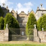 Hundreds of antiques from haunted Jacobean mansion Plas Teg, including rare ceramics, paintings, and Victorian furnishings, are up for auction to cover the owner's care costs.