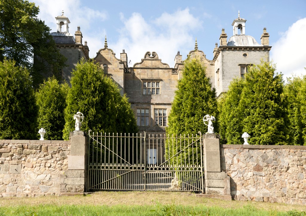 Hundreds of antiques from haunted Jacobean mansion Plas Teg, including rare ceramics, paintings, and Victorian furnishings, are up for auction to cover the owner's care costs.