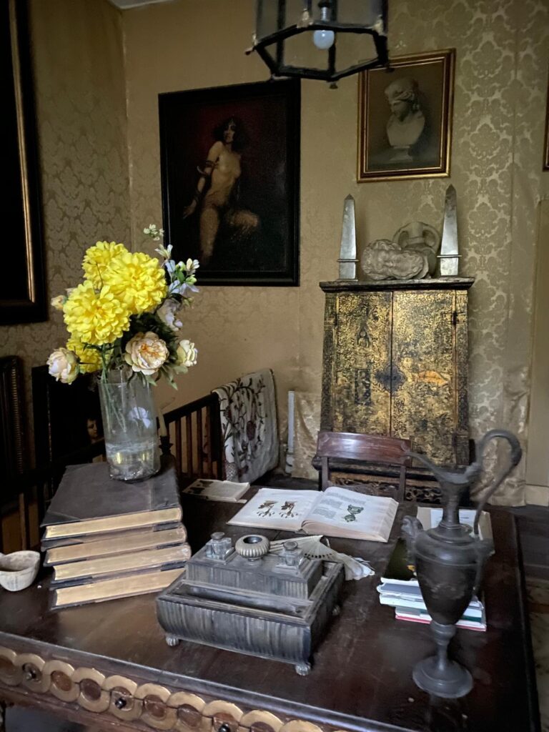 Hundreds of antiques from haunted Jacobean mansion Plas Teg, including rare ceramics, paintings, and Victorian furnishings, are up for auction to cover the owner's care costs.