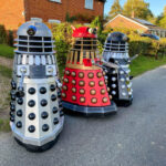 Doctor Who superfan Mark Casto builds lifesize Daleks to delight locals and support charity events, combining his graphic design skills with a lifelong passion for the show.