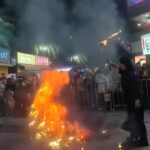 Fire breather's flaming sword stunt goes wrong in Fujian, China, setting a spectator ablaze. Viral video sparks laughs and debates on safety and blade quality.