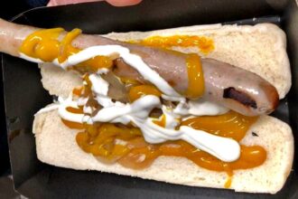 Fulham fans outraged over £8.25 halftime hot dog at Craven Cottage, slamming its pale sausage and sloppy presentation during the 1-0 loss to Manchester United.