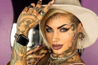 A tattoo artist, known as Brookelle Bombshelle, has spent over £10,000 on 160 tattoos, ignoring public stares and family questions, as she works toward a full body suit.