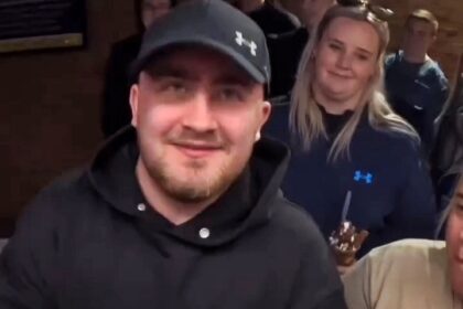 Ice cream van man sparks debate after giving millionaire darts champ £16 worth of treats for free, despite the star offering to pay—fans divided over special treatment.