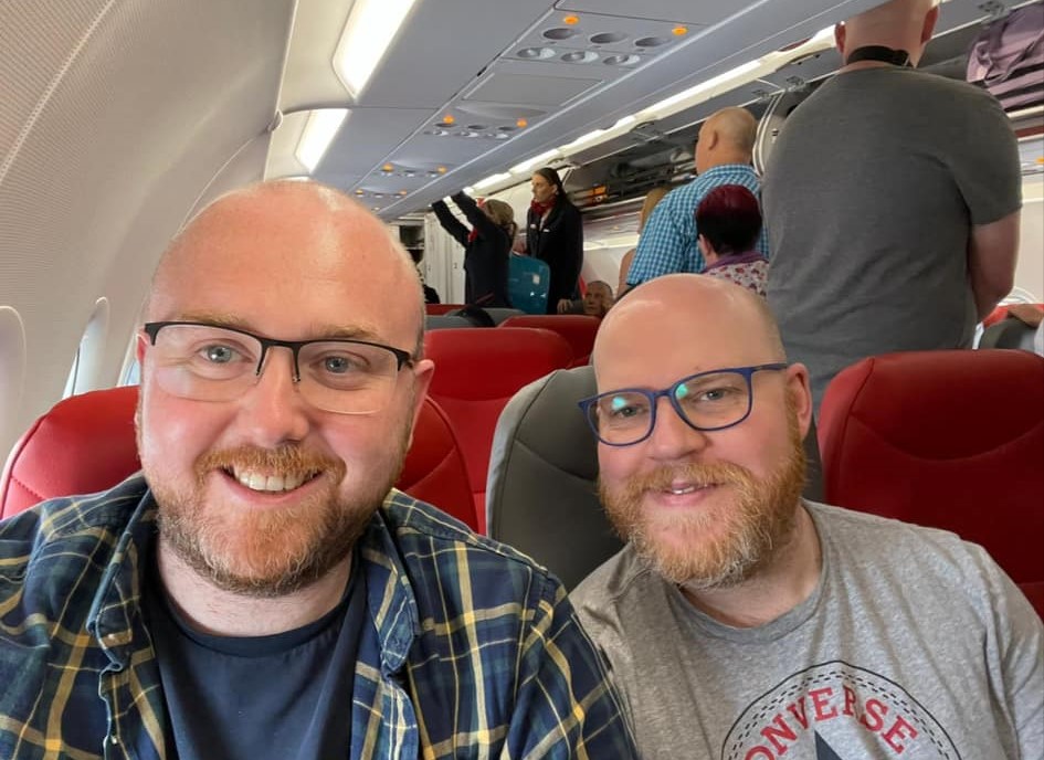 A married couple with bald heads, ginger beards, and matching glasses are often mistaken for brothers. Their TikTok explanation has racked up over 224,000 views!