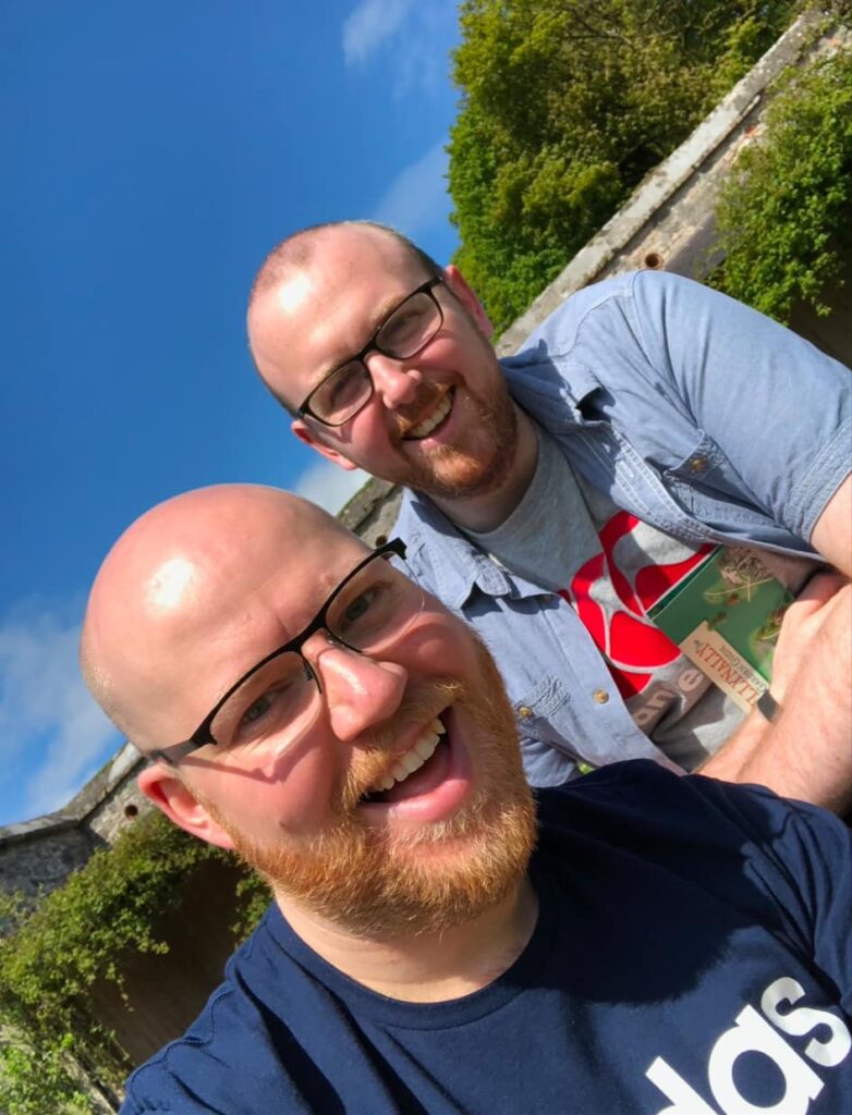 A married couple with bald heads, ginger beards, and matching glasses are often mistaken for brothers. Their TikTok explanation has racked up over 224,000 views!