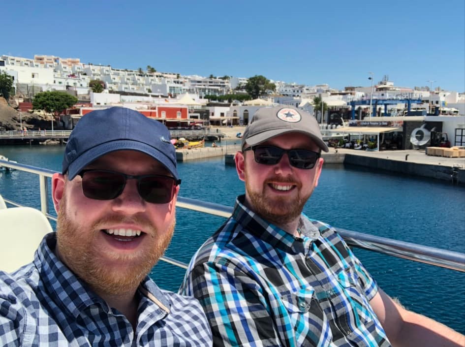 A married couple with bald heads, ginger beards, and matching glasses are often mistaken for brothers. Their TikTok explanation has racked up over 224,000 views!