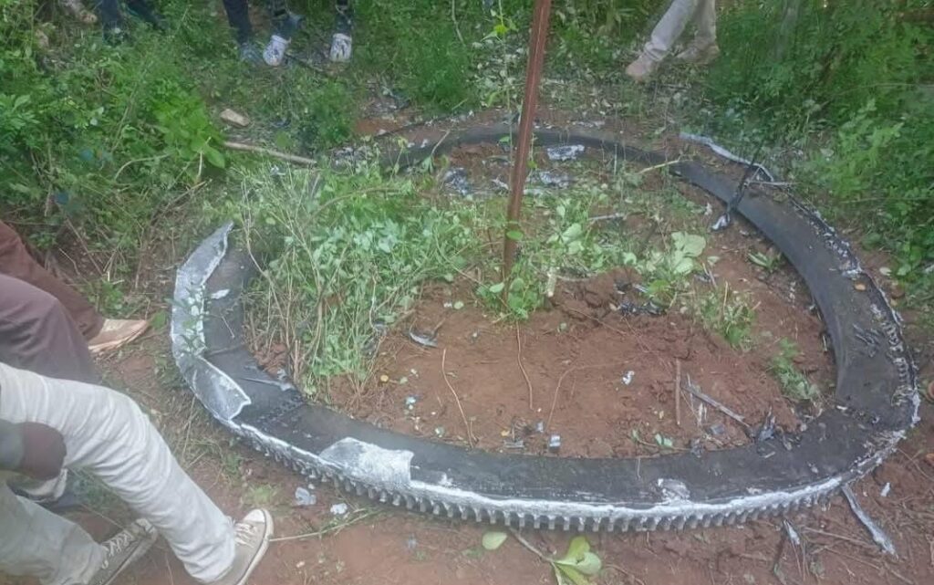 A half-tonne space ring landed in Mukuku, Kenya, baffling locals. Believed to be rocket debris, the Kenya Space Agency secured it, confirming no injuries occurred.