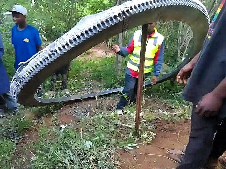 A half-tonne space ring landed in Mukuku, Kenya, baffling locals. Believed to be rocket debris, the Kenya Space Agency secured it, confirming no injuries occurred.