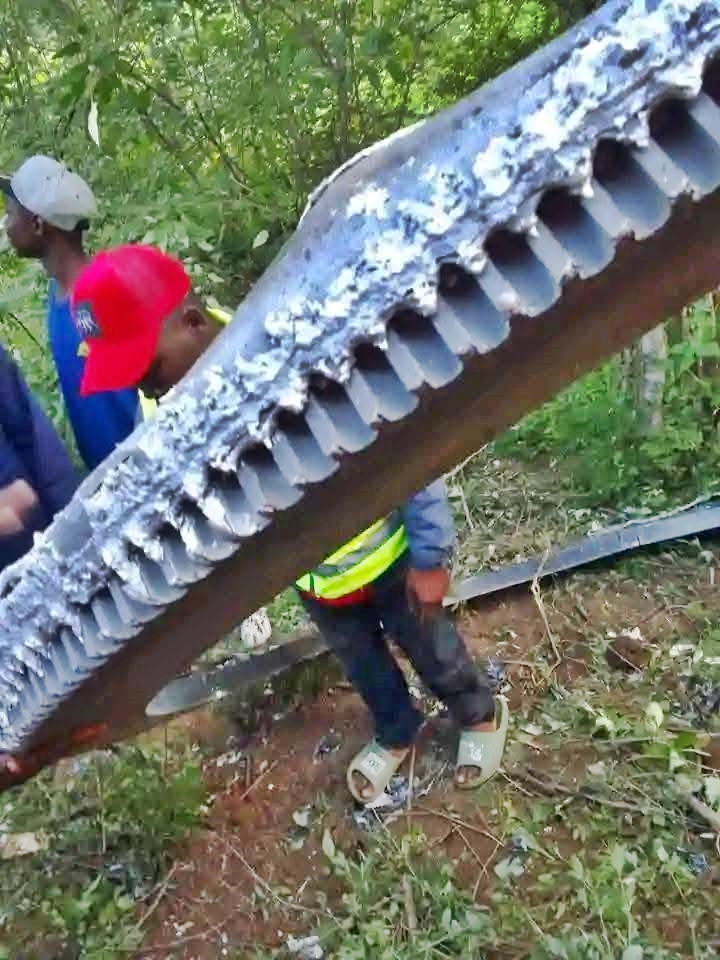 A half-tonne space ring landed in Mukuku, Kenya, baffling locals. Believed to be rocket debris, the Kenya Space Agency secured it, confirming no injuries occurred.