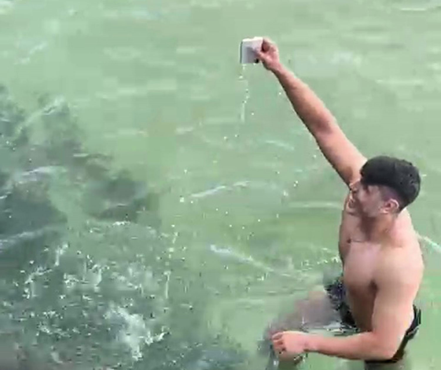 A man waded into the sea in St Ives to rescue his phone, only for it to be beyond repair. Onlookers cheered—but now he just needs a bag of rice (or a new phone).