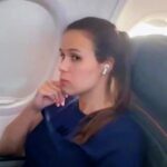 A plane passenger, praised for refusing to swap seats with a toddler, is considering legal action after being filmed and criticized by the child’s mother during a flight.