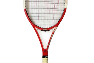 Roger Federer's 2004 Wimbledon-winning racket, signed for Anna Wintour, is up for auction—expected to fetch over £80,000. A rare piece of tennis history!