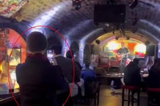 Singer stunned as Green Day’s Billie Joe Armstrong surprises him at Liverpool’s Cavern Club, clapping and filming as he performs Green Day’s iconic *Good Riddance*.