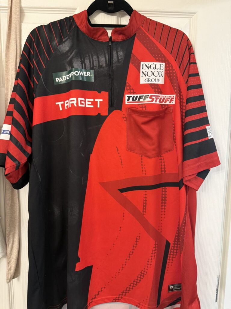 Stephen Bunting cashes in on PDC World Championship fame by selling his semi-final match shirt worn against champ Luke Littler for £125. Fans are baffled but intrigued!