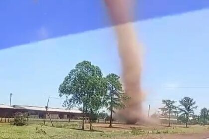 A towering dust devil ripped through a roadside in Gobernador Virasoro, Argentina, startling locals. Unlike tornadoes, these whirlwinds spiral upward from hot ground air.