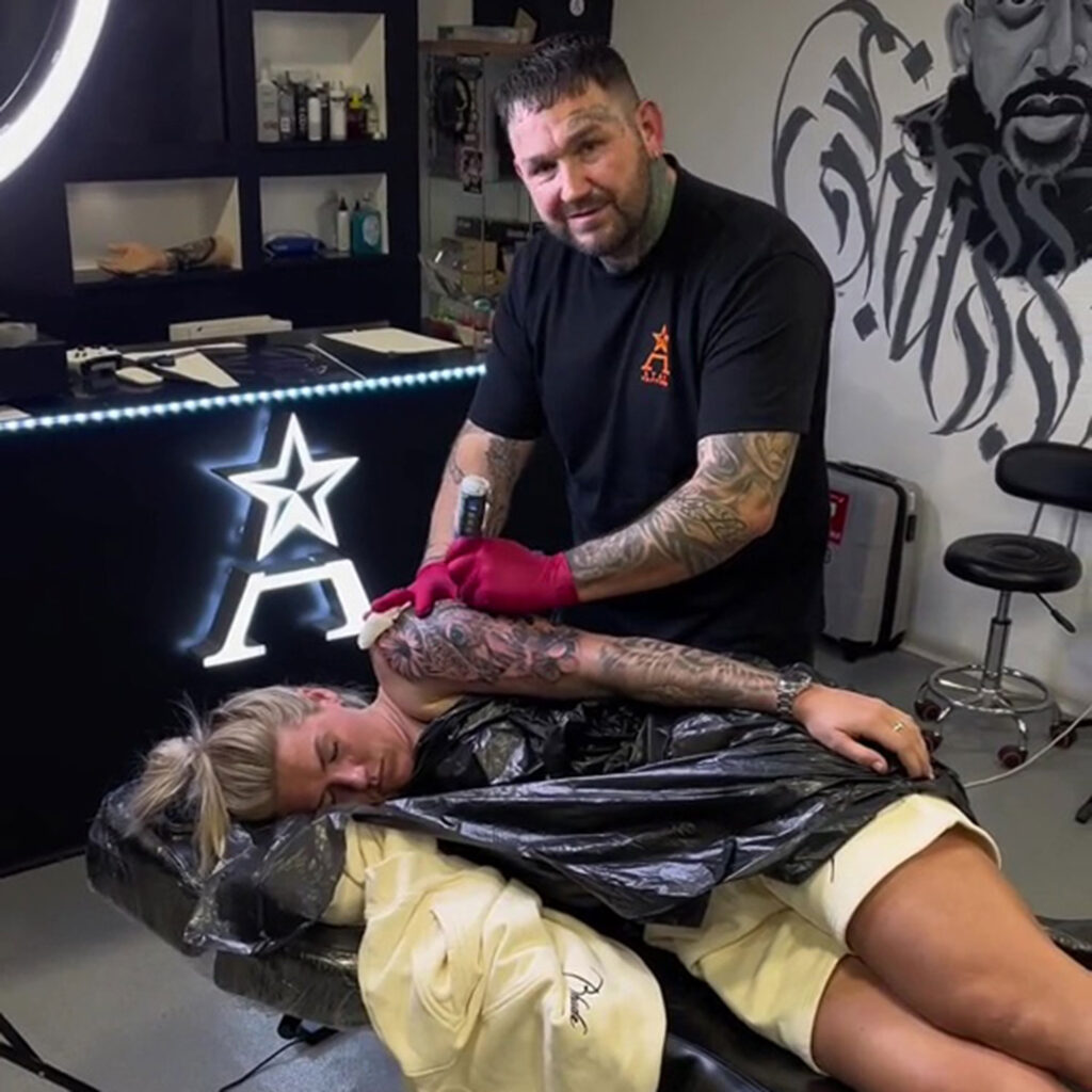 A tattooist, loved by Premier League stars, shares his journey from addiction to success in a new music video, inspiring others with his story of resilience and triumph.