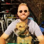 A devoted dog owner spends £500 a month on his Border Terrier, Bruce, including holidays abroad, £160 grooming sessions, and an £800 birthday party, calling him his "pride and joy."