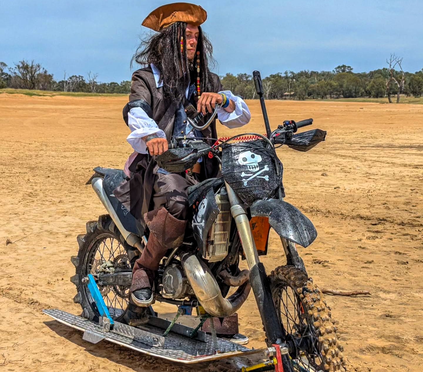 A French adventurer in Australia built a motorcycle that rides on water with no engineering experience, using makeshift materials and sheer determination to bring his vision to life.