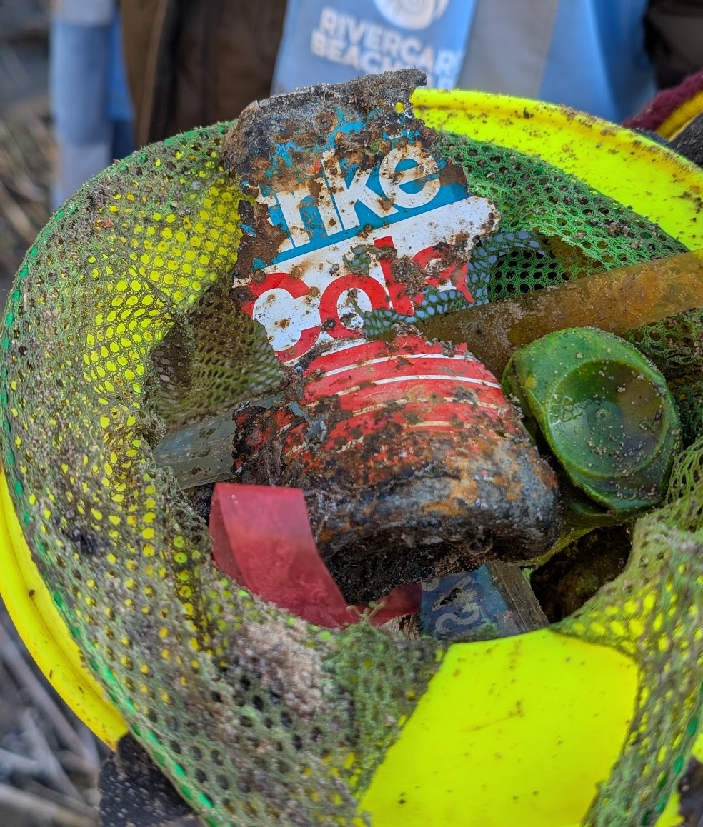 A 160-year-old beer bottle was discovered by litter pickers near the River Witham in Grantham, highlighting how long waste lingers alongside cans from the 1970s and 1980s.