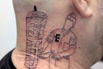 A restaurant owner in Tel Aviv got a giant Doner kebab tattoo inked on his neck, celebrating his love for shawarma. The bold design has sparked mixed reactions online.