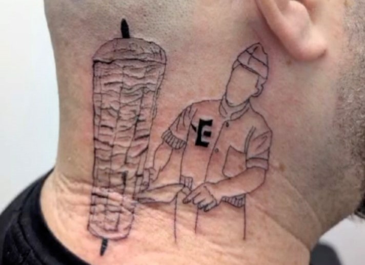 A restaurant owner in Tel Aviv got a giant Doner kebab tattoo inked on his neck, celebrating his love for shawarma. The bold design has sparked mixed reactions online.