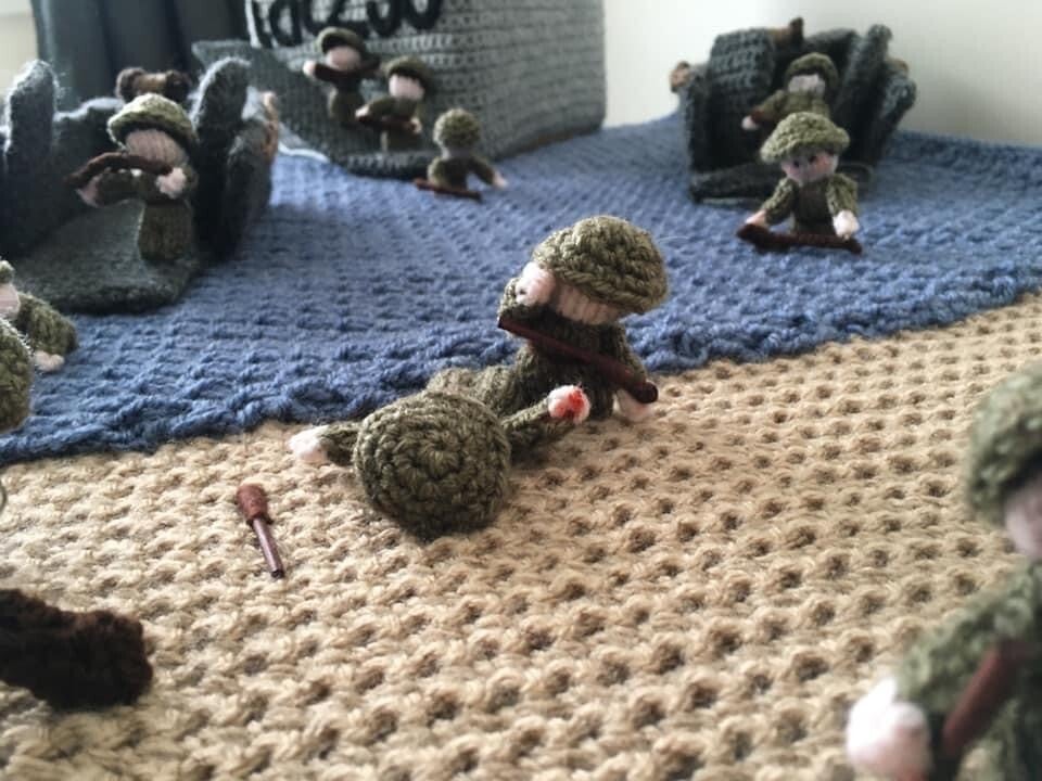 A knitted D-Day exhibition, The Longest Yarn, was canceled in Norwich over safety concerns, but will now be displayed at Peterborough Cathedral in March.